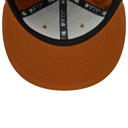 New Era Brown 9FIFTY Snapback Adjustable Cap, inside view showing black and grey taping with white 9FIFTY branding, a soft grey sweatband, and a solid brown undervisor, along with matching brown stitched eyelets.