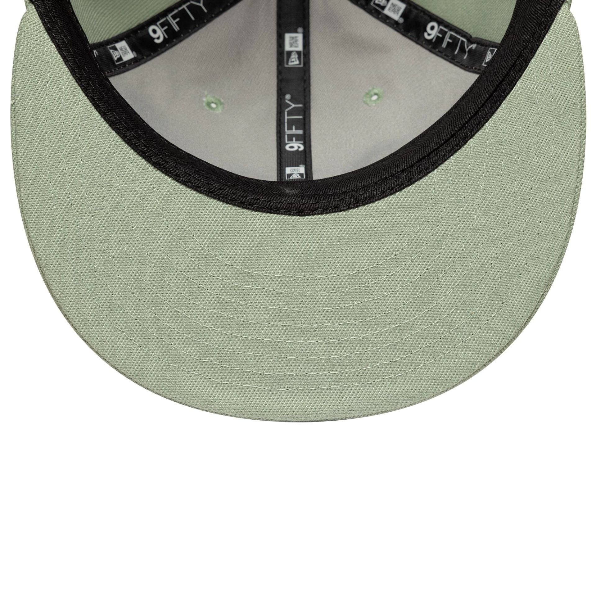 This is a New Era Green Retro Crown 9FIFTY Snapback Adjustable Cap 7
