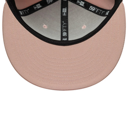 New Era Blank Pink 59FIFTY Fitted Cap, inside view showing a black sweatband with 59FIFTY branding, a soft pink undervisor with detailed stitching, and matching pink taping across the panels.
