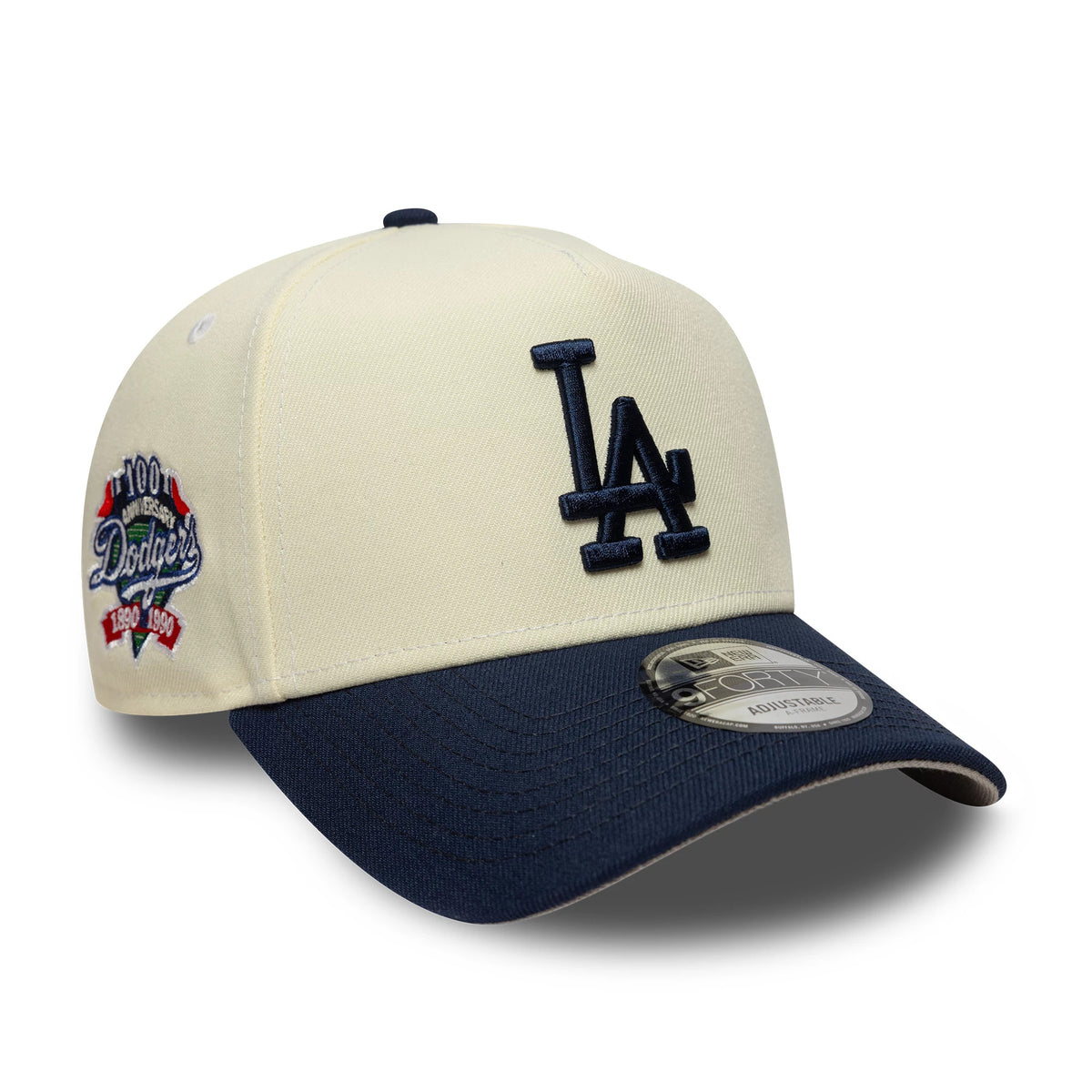 LA Dodgers MLB Chrome Blue Contrast Cream New Era 9FORTY A-Frame Adjustable Cap, front and side view showing the navy embroidered LA logo on the cream structured crown, dark blue curved visor with a 9FORTY size sticker.