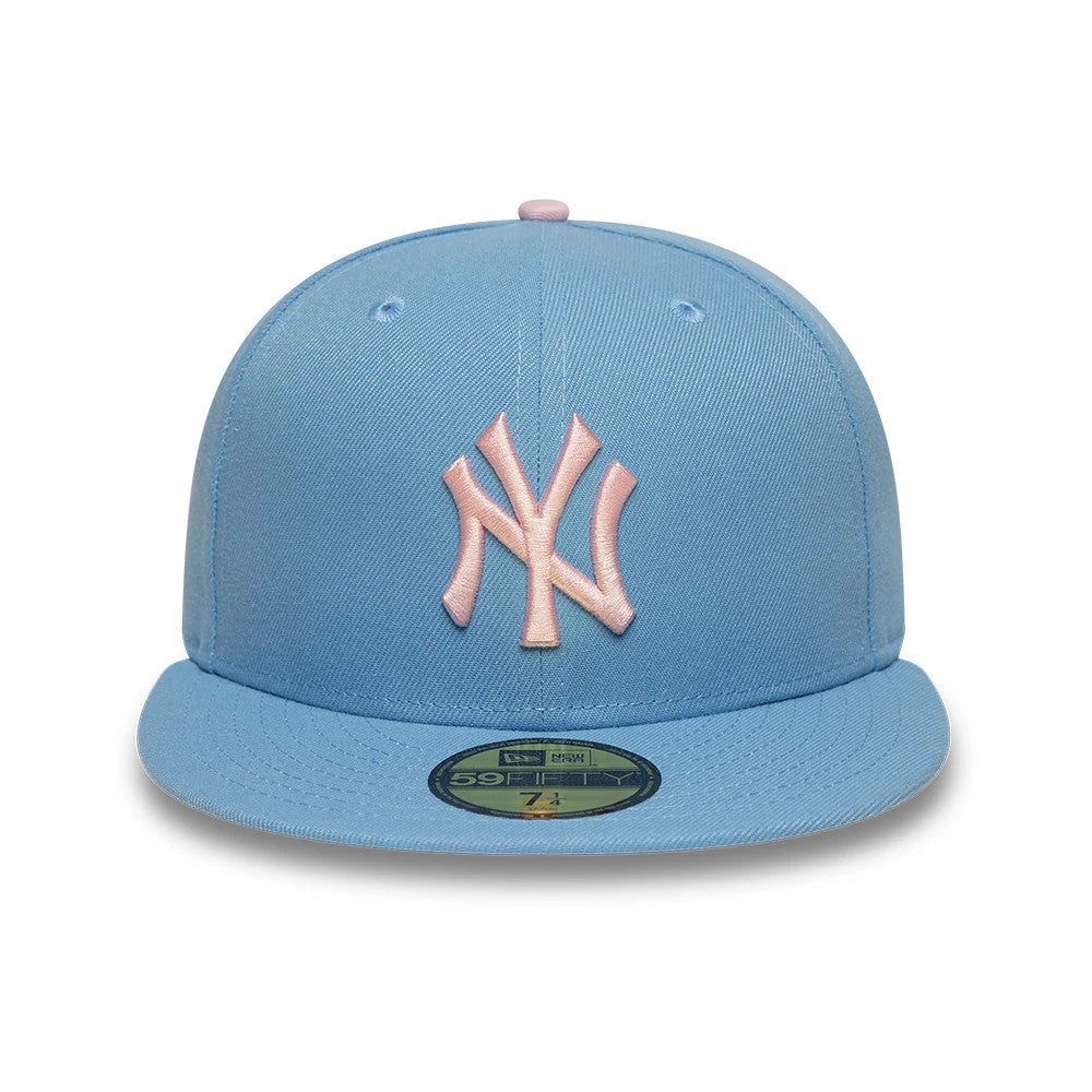 New York Yankees MLB Pastel Blue New Era 59FIFTY Fitted Cap, front view showing the raised pink embroidered NY logo on the structured pastel blue crown, with a perfectly flat blue visor and the gold 59FIFTY size sticker on the front.
