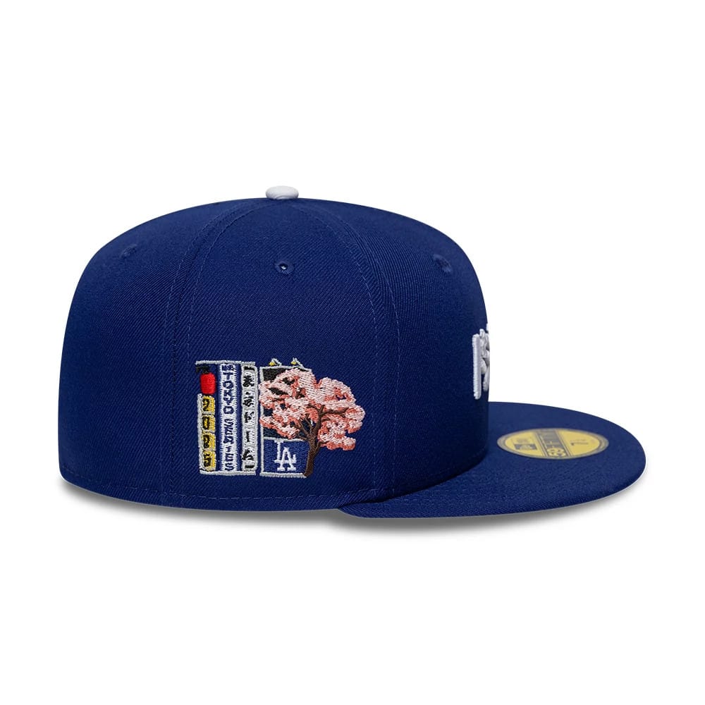 Pictured is this MLB Kanji LA Dodgers 59FIFTY Fitted cap in dark blue. 6