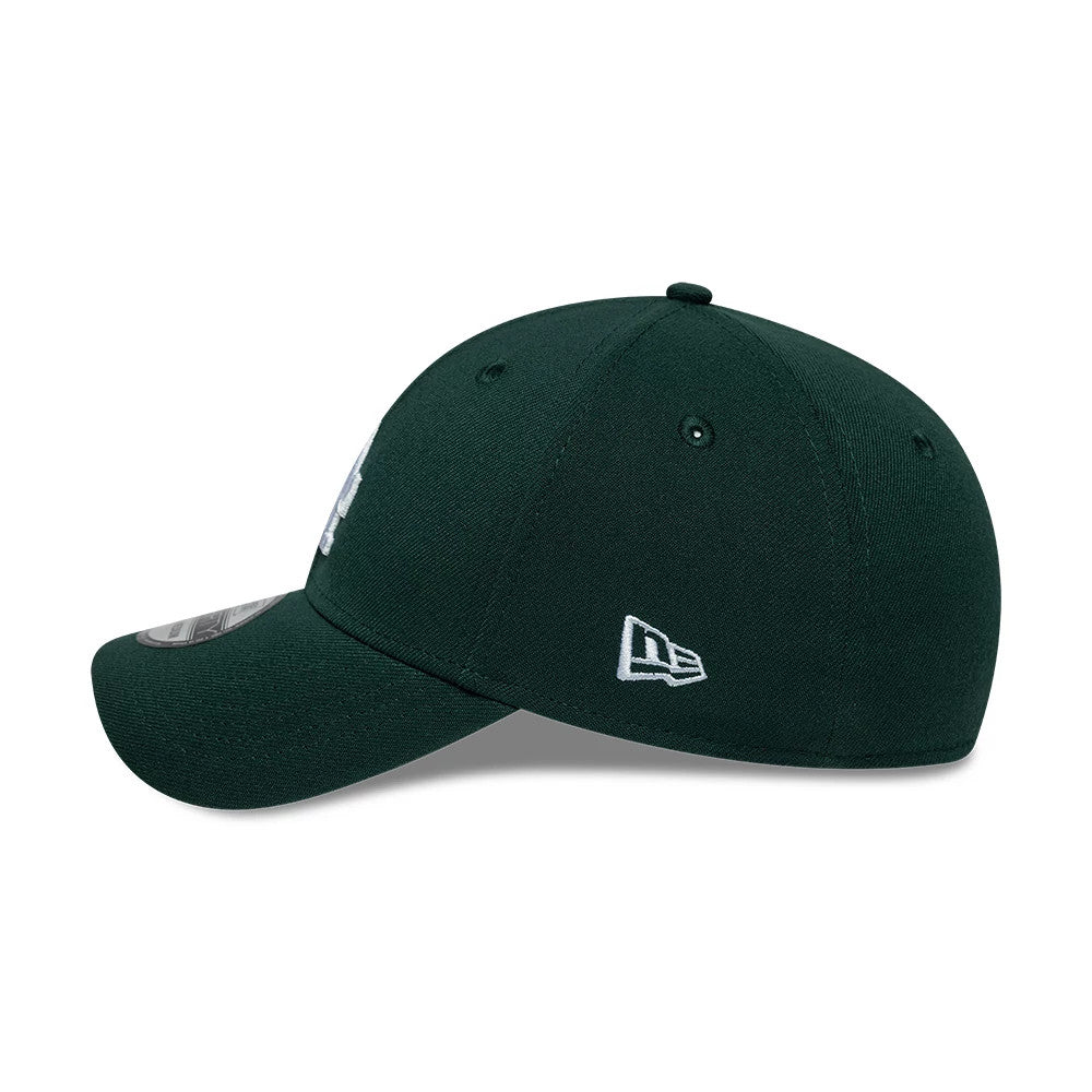 LA Dodgers MLB Dark Green New Era 39THIRTY Stretch Fit Cap, side view showing the white New Era flag logo on the left side of the structured dark green crown, with a curved visor and a size sticker on the top.