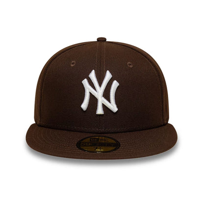 Pictured is this MLB New York Yankees 59FIFTY Fitted cap in dark brown. 3