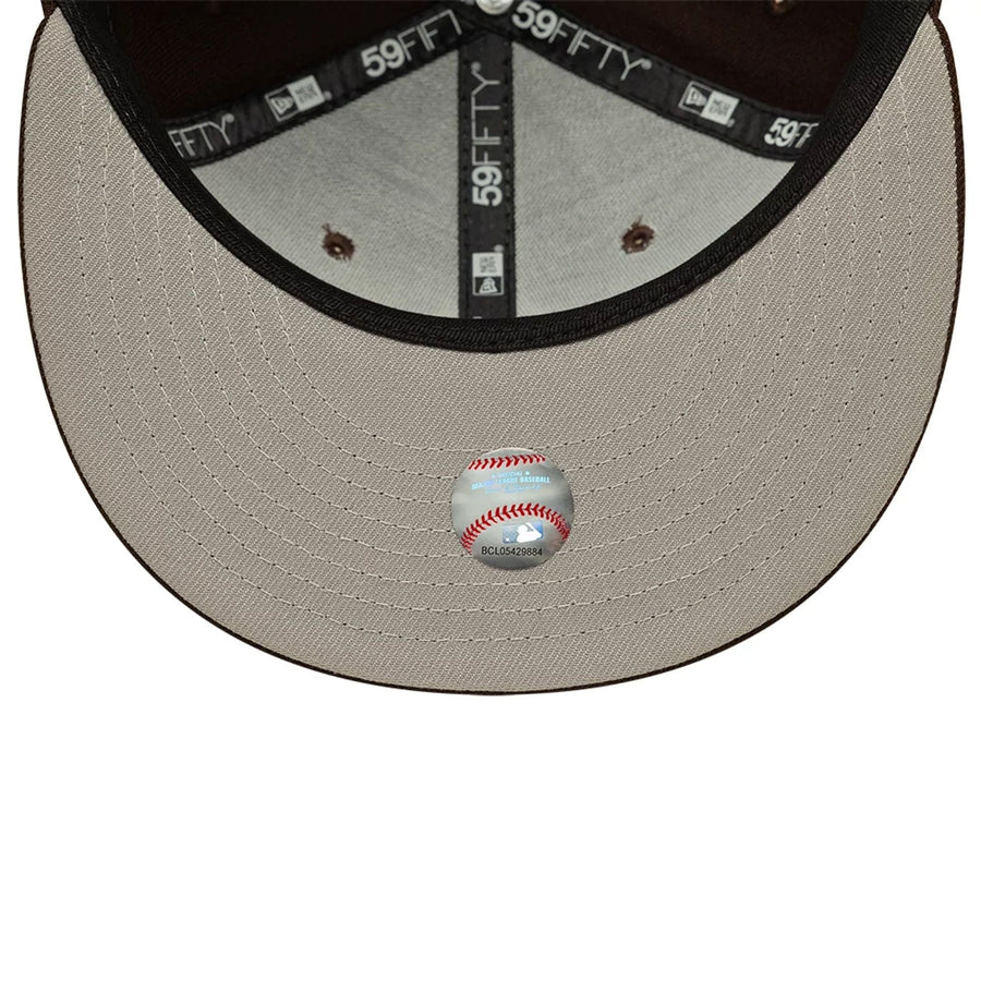 Pictured is this MLB New York Yankees 59FIFTY Fitted cap in dark brown. 2