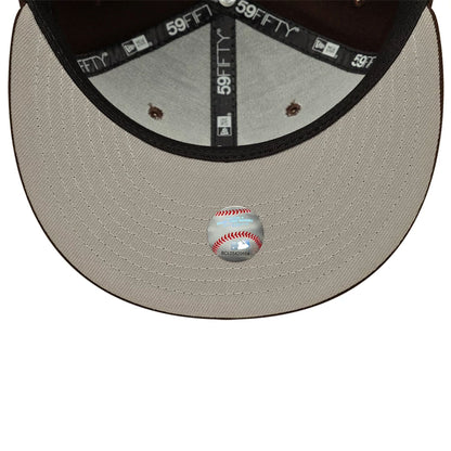 Pictured is this MLB New York Yankees 59FIFTY Fitted cap in dark brown. 2