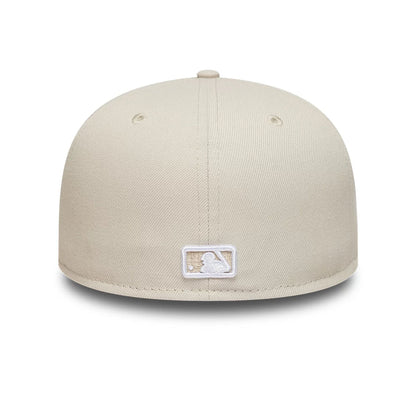 Pictured is this MLB Athletics 59FIFTY Fitted cap in beige. 5