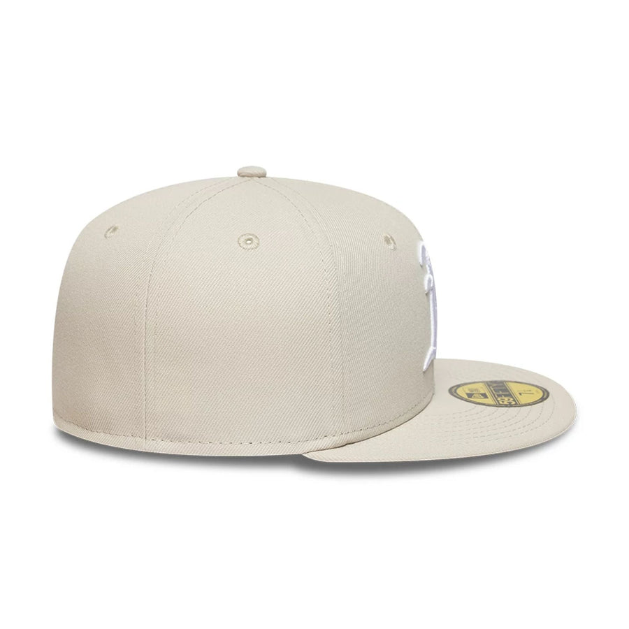 Pictured is this MLB Athletics 59FIFTY Fitted cap in beige. 7