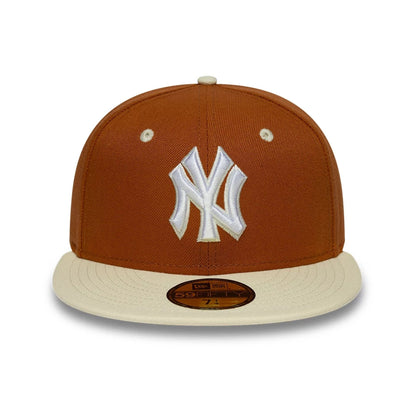 Pictured is this MLB Contrast New York Yankees 59FIFTY Fitted cap in brown. 2