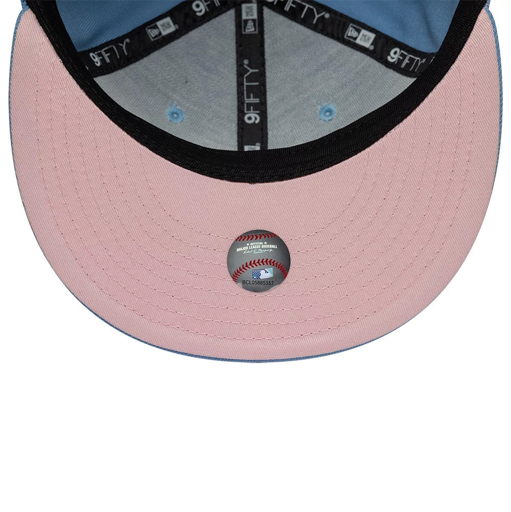 Pictured is this MLB Upside Down LA Angels 9FIFTY Snapback cap in pastel blue. 2
