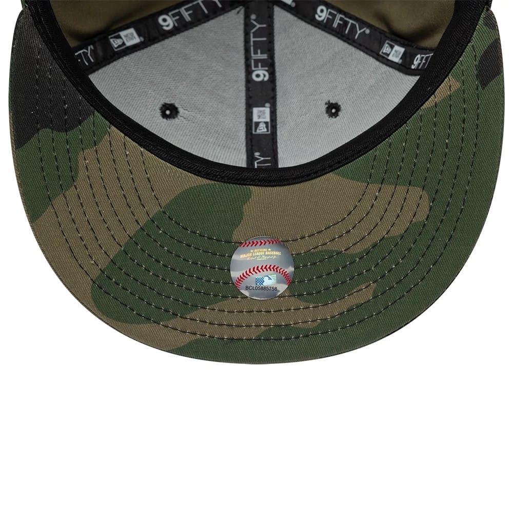 Pictured is this MLB Camo New York Yankees 9FIFTY Snapback cap in green. 7