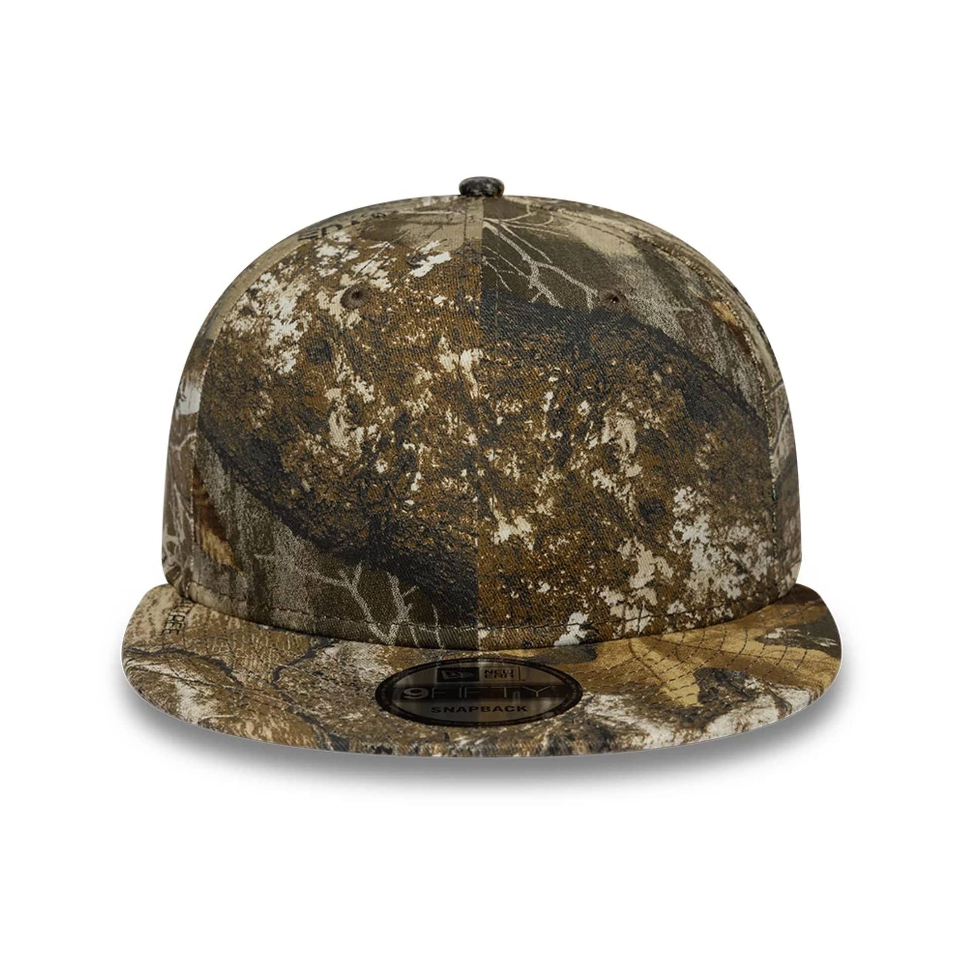 Pictured is this New Era Real Tree 9FIFTY Snapback cap in beige. 2