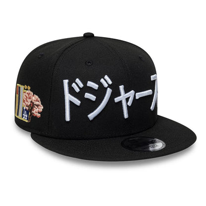 Pictured is this MLB Kanji LA Dodgers 9FIFTY Snapback Adjustable cap in black. 1