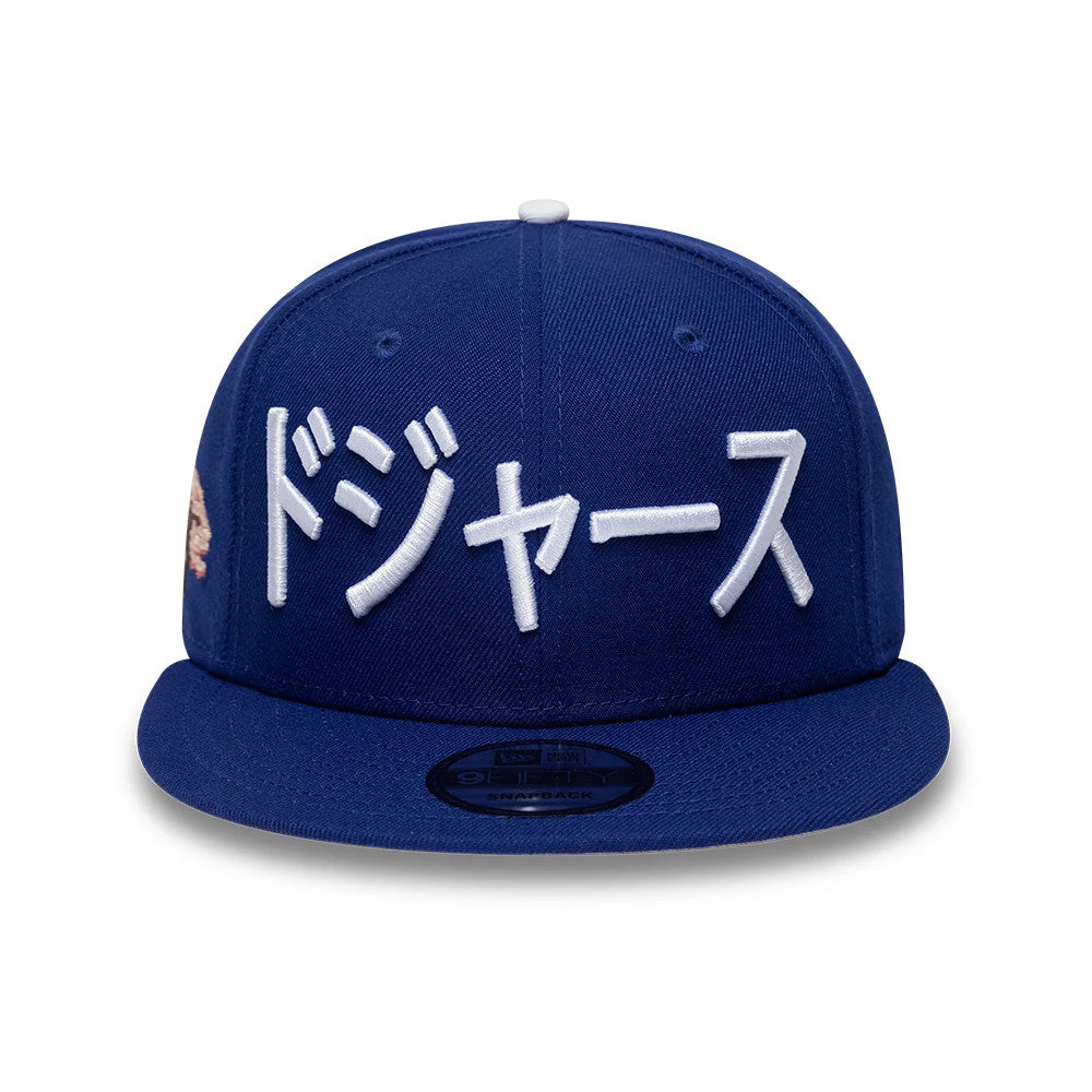 Pictured is this MLB Kanji LA Dodgers 9FIFTY Snapback Adjustable cap in dark blue. 3