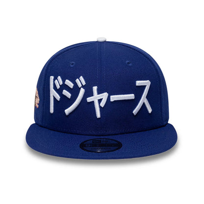 Pictured is this MLB Kanji LA Dodgers 9FIFTY Snapback Adjustable cap in dark blue. 3