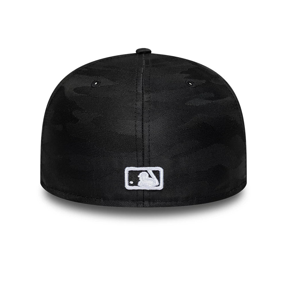 LA Dodgers MLB Camo Black New Era 59FIFTY Fitted Cap, rear view showing the white embroidered MLB Batterman logo at the centre of the back panels, with a black camouflage pattern on the structured crown.