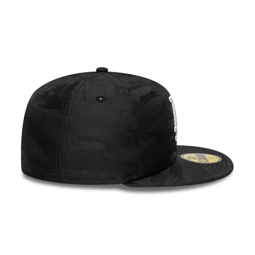 LA Dodgers MLB Camo Black New Era 59FIFTY Fitted Cap, side view showing the New Era flag logo on the left side, with a camo pattern on the black structured crown and a flat visor featuring the gold 59FIFTY size sticker.