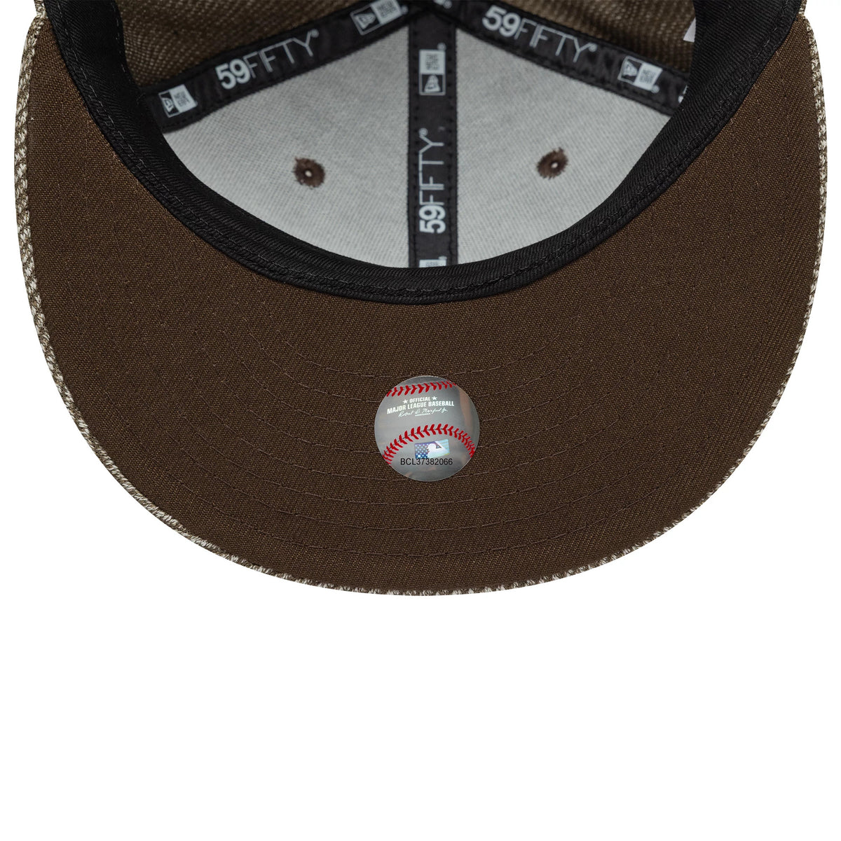 Pictured is this MLB Heather Brown New York Yankees 59FIFTY Fitted cap. 2