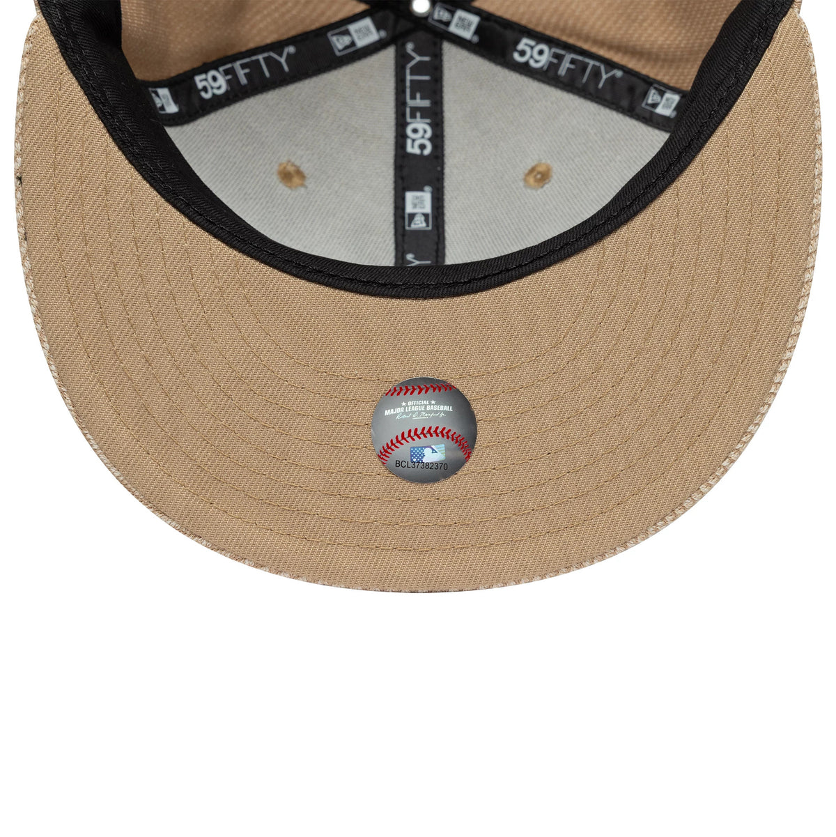 LA Dodgers MLB Heather Tan New Era 59FIFTY Fitted Cap, inside view showing a tan undervisor with a baseball graphic sticker, black interior sweatband, and black and white 59FIFTY taping lining the grey panels for added detail.