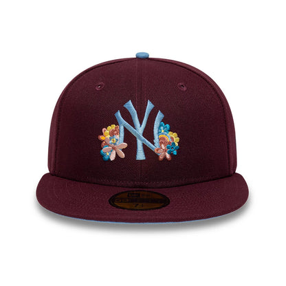Pictured is this  MLB Floral New York Yankees 59FIFTY Fitted cap in dark purple. 3