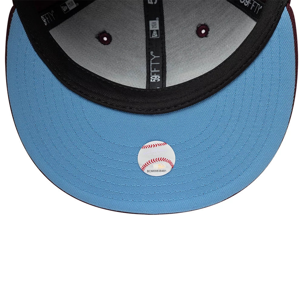 Pictured is this  MLB Floral New York Yankees 59FIFTY Fitted cap in dark purple. 2