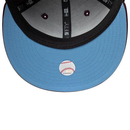 Pictured is this  MLB Floral New York Yankees 59FIFTY Fitted cap in dark purple. 2