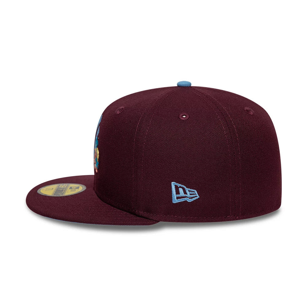 Pictured is this  MLB Floral New York Yankees 59FIFTY Fitted cap in dark purple. 6