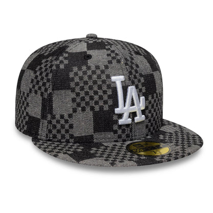 LA Dodgers MLB Denim Black New Era 59FIFTY Fitted Cap, three-quarter view showing a white embroidered LA logo on the front panel, a distinctive black and grey checkered denim pattern, and the gold 59FIFTY size sticker on the flat visor.
