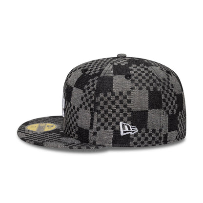LA Dodgers MLB Denim Black New Era 59FIFTY Fitted Cap, side view showing the New Era flag logo embroidered in white on the left side, with a textured black and grey check pattern across the crown and visor.