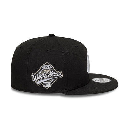 Pictured is this Youth MLB New York Yankees 9FIFTY Snapback cap in black. 7