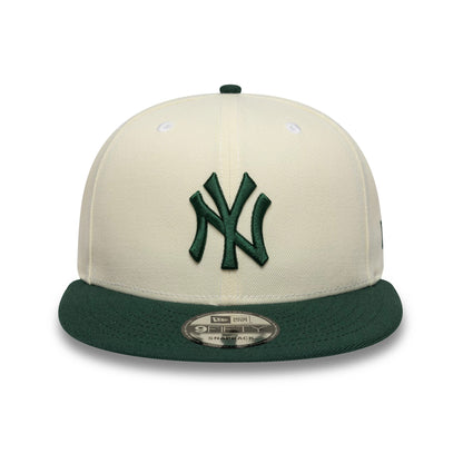 Pictured is this MLB New York Yankees 9FIFTY Snapback cap in cream and dark green. 2