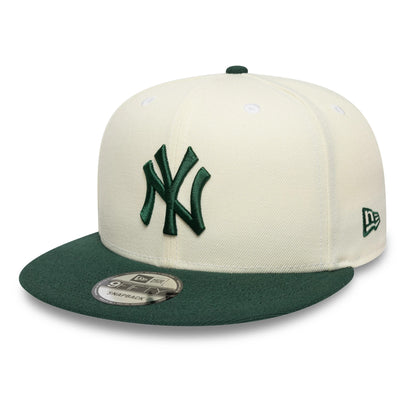 Pictured is this MLB New York Yankees 9FIFTY Snapback cap in cream and dark green. 1