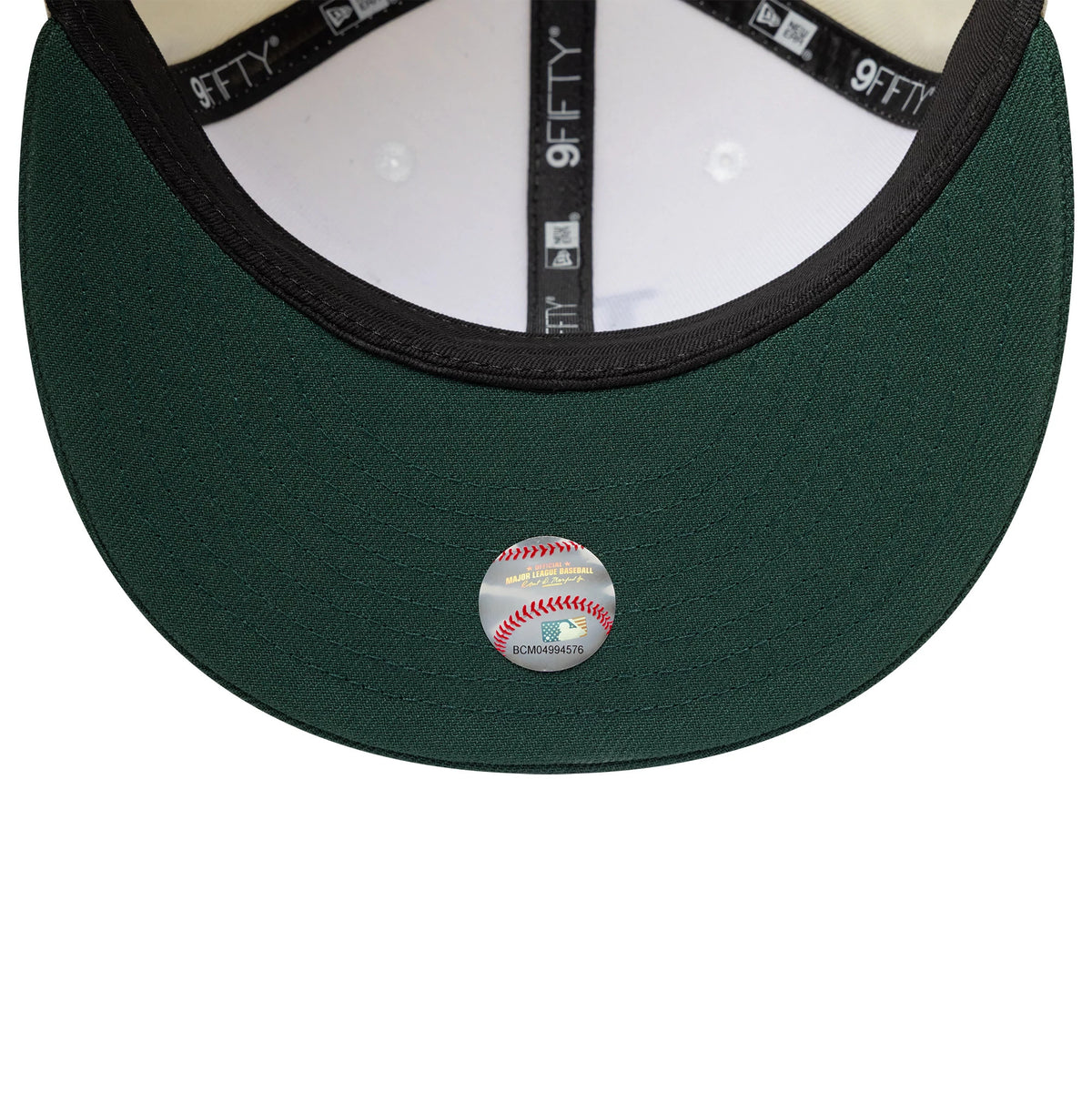 Pictured is this MLB LA Dodgers 9FIFTY Snapback cap in cream and dark green. 7