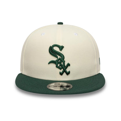 Pictured is this MLB Chicago White Sox 9FIFTY Snapback cap in cream and dark green. 2