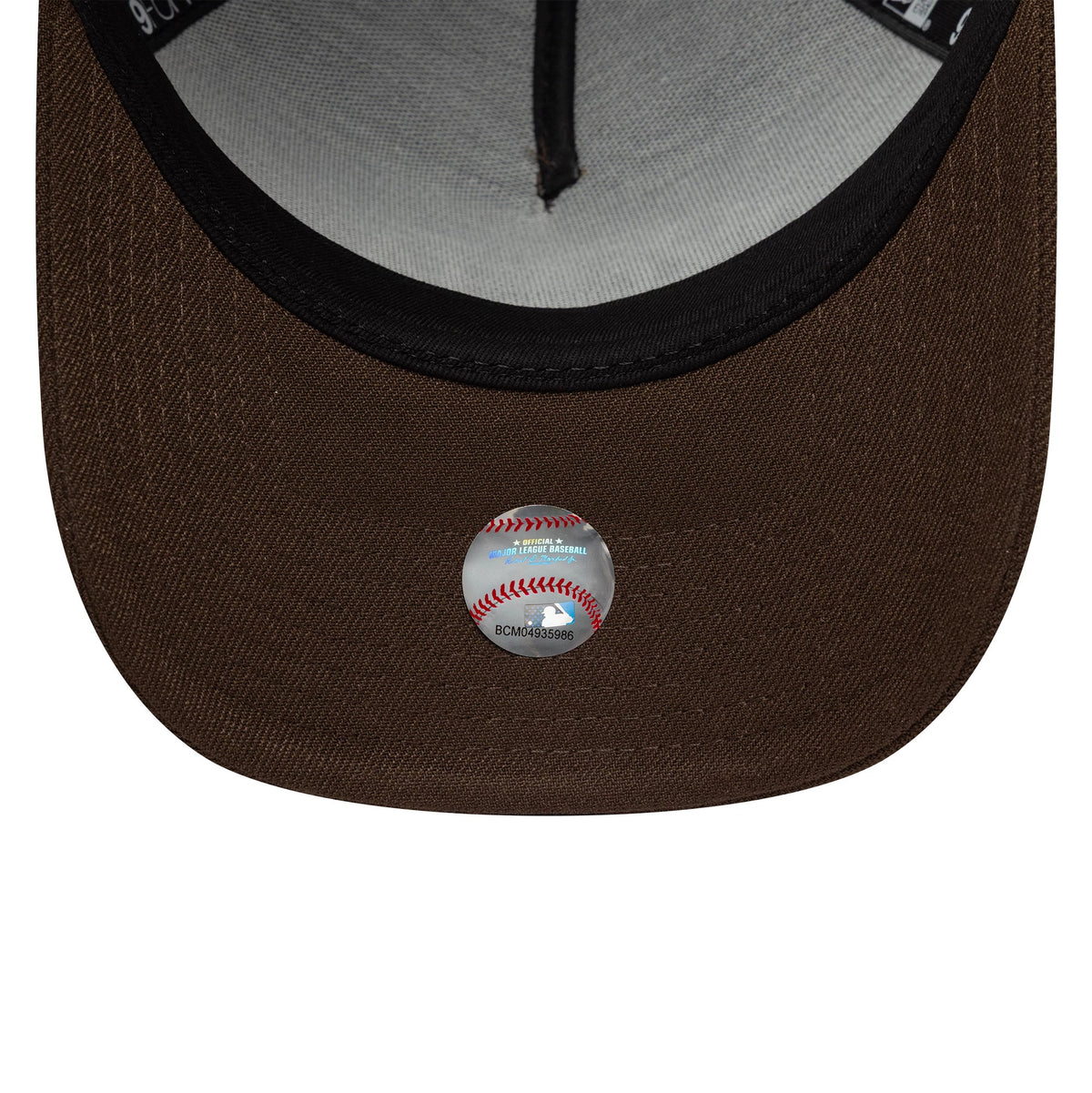 Pictured is this MLB Duelling Logos Yankees VS Dodgers 9FORTY A-Frame cap in dark brown. 7