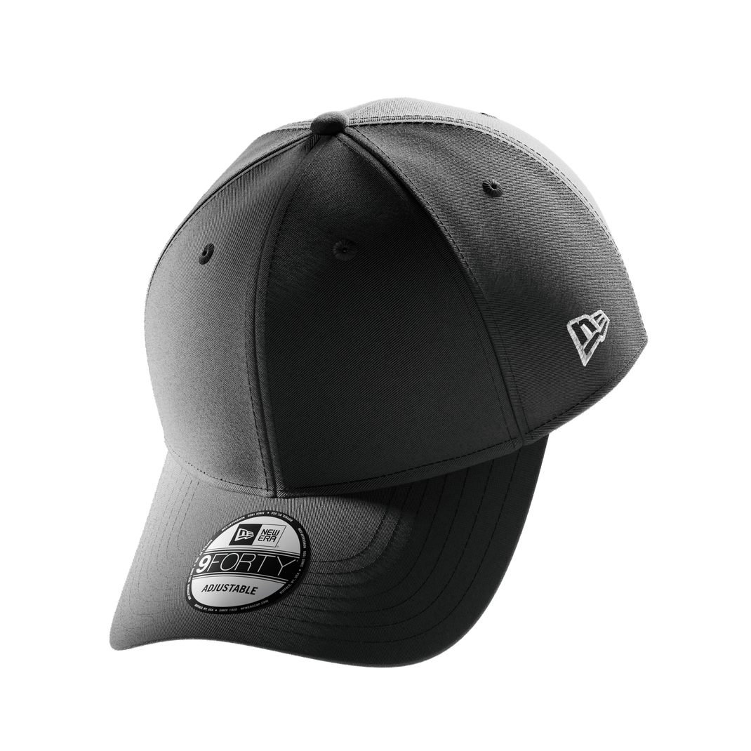 A black New Era 9FORTY cap with a white embroidered logo on the side and a circular black and white sticker on the brim, shown against a plain white background.