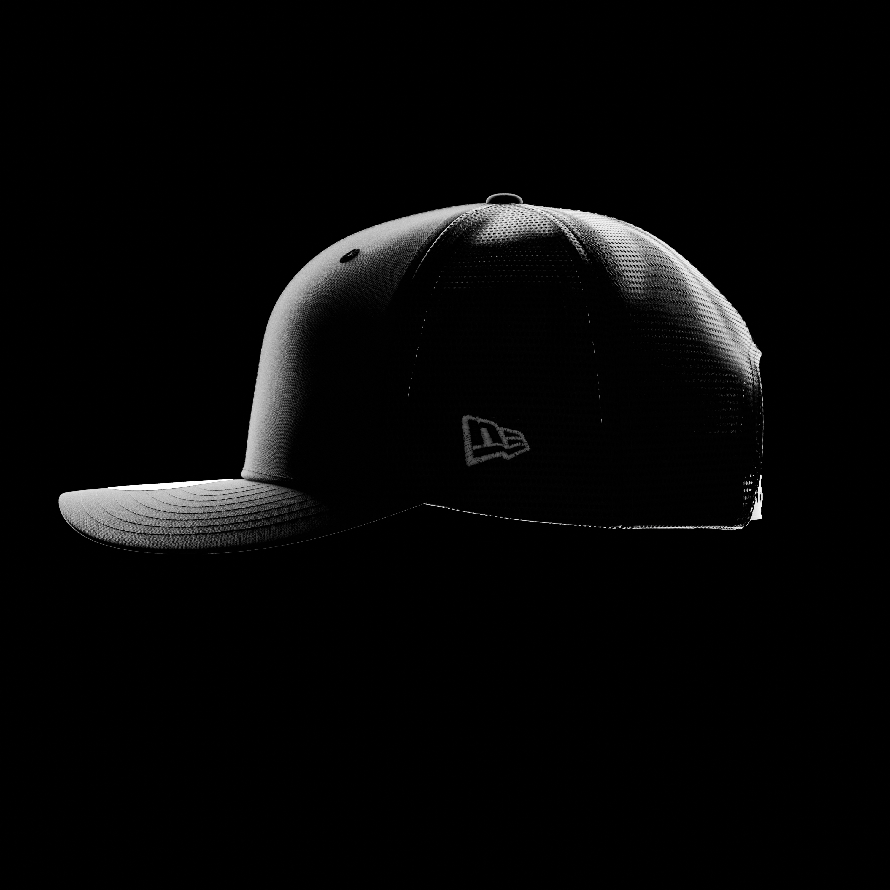 black new era 9seventy trucker cap on a black background