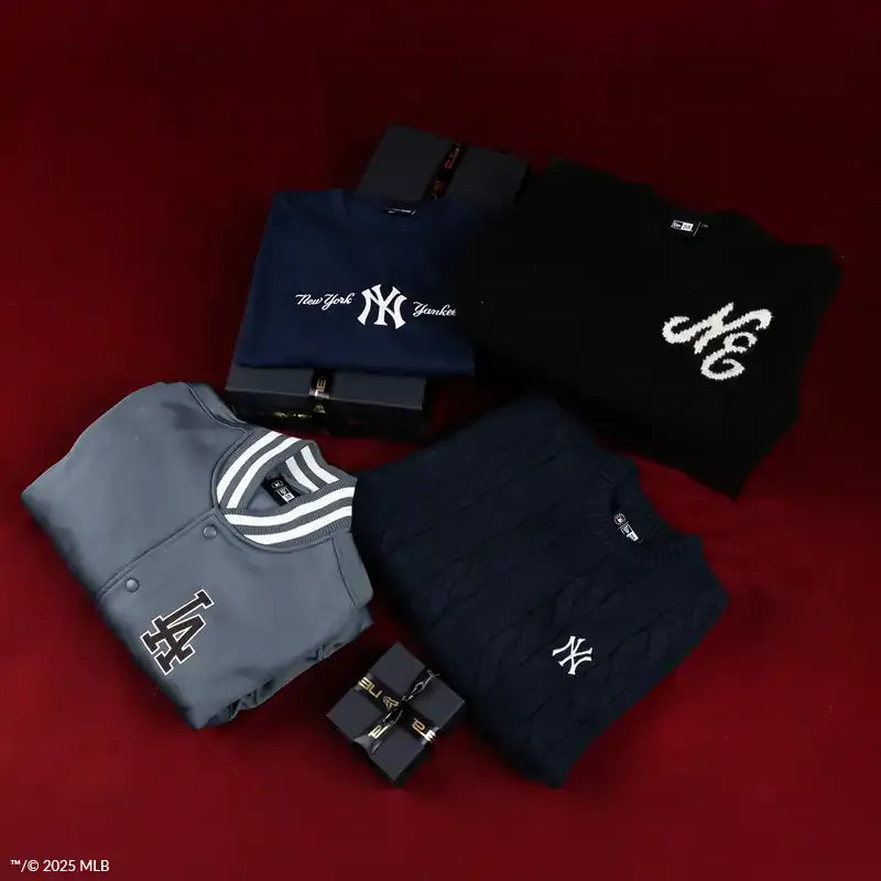 Four hoodies with different logos on a red background, featuring MLB branding.