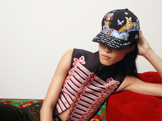 Slide 1:NEW ERA X KENZO