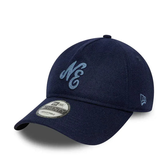 Slide 2:Navy blue cap with 'NE' logo on a white background