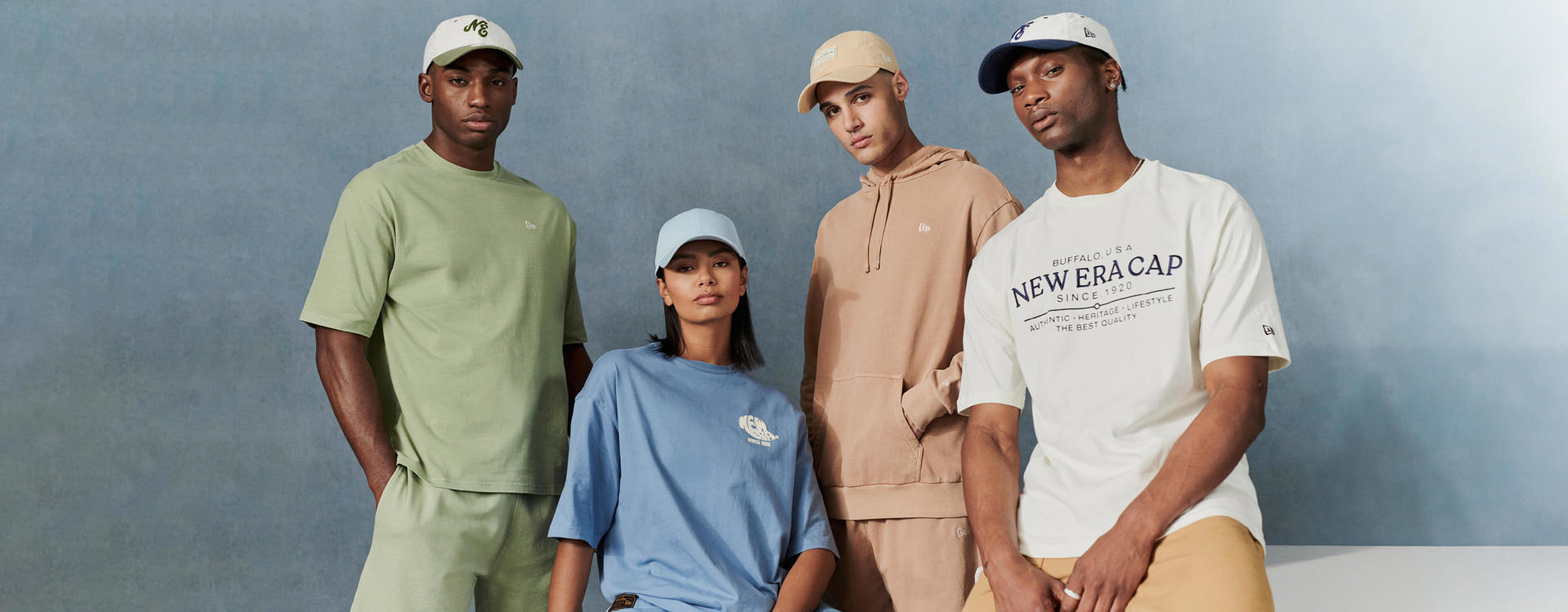 one female and three males wearing the New Era Heritage Collection