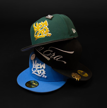 new era fitted hats stacked on top of each other
