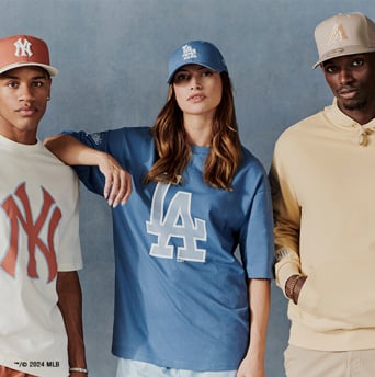 group of people wearing mlb clothing - t-shirts, caps and trousers