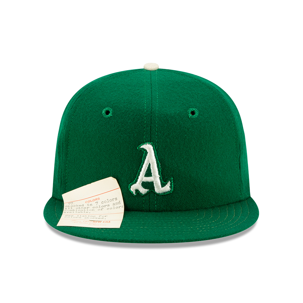 Green 59FIFTY retro baseball cap against white background 